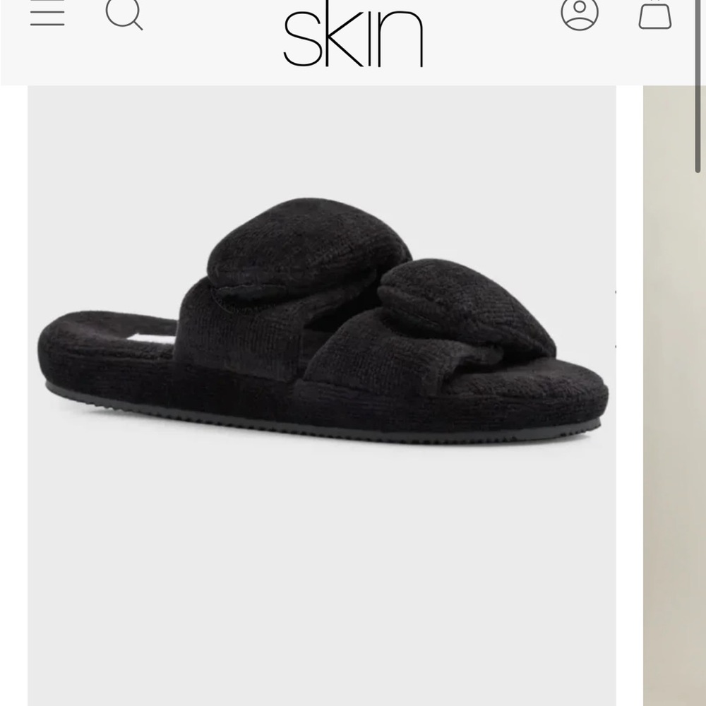Black slippers from Skin.